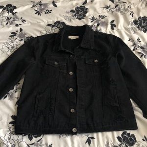 Distressed denim jacket